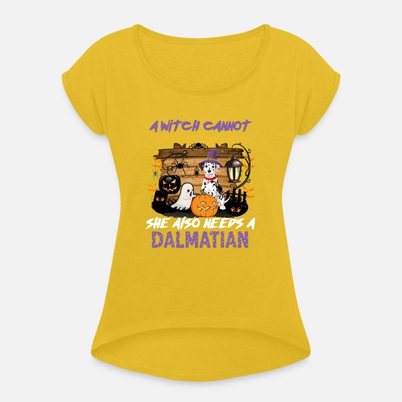 Dalmatian in Halloween disguise sitting on a broom